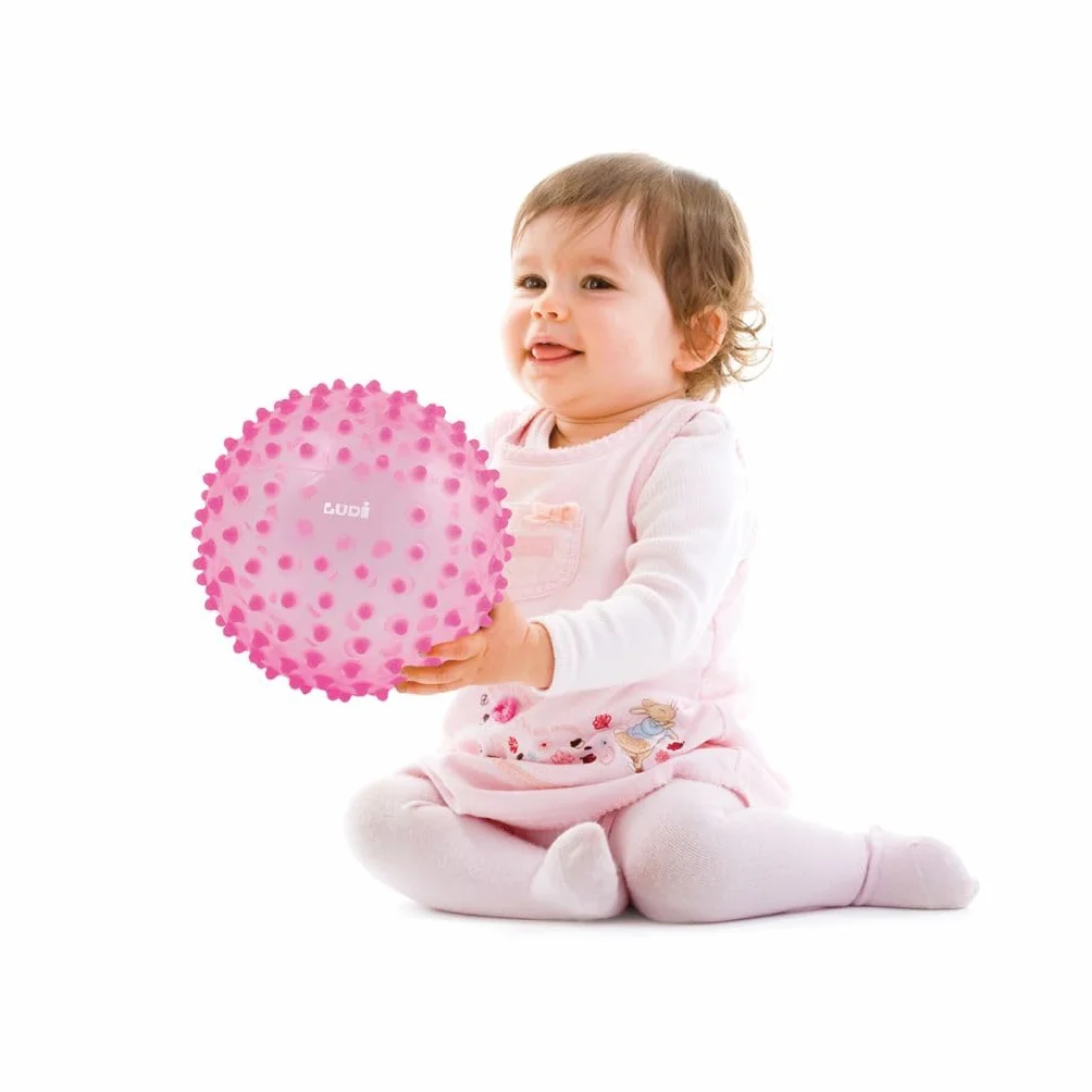 Ludi - Palla da massaggio rosa - Risveglio sensoriale per bambini dai 6 mesi - Puntine teneri - Stimolazione, Destrezza e Coordinazione - 100% PVC - Lavabile - Ø 20 cm - Allevia i denti e favorisce il