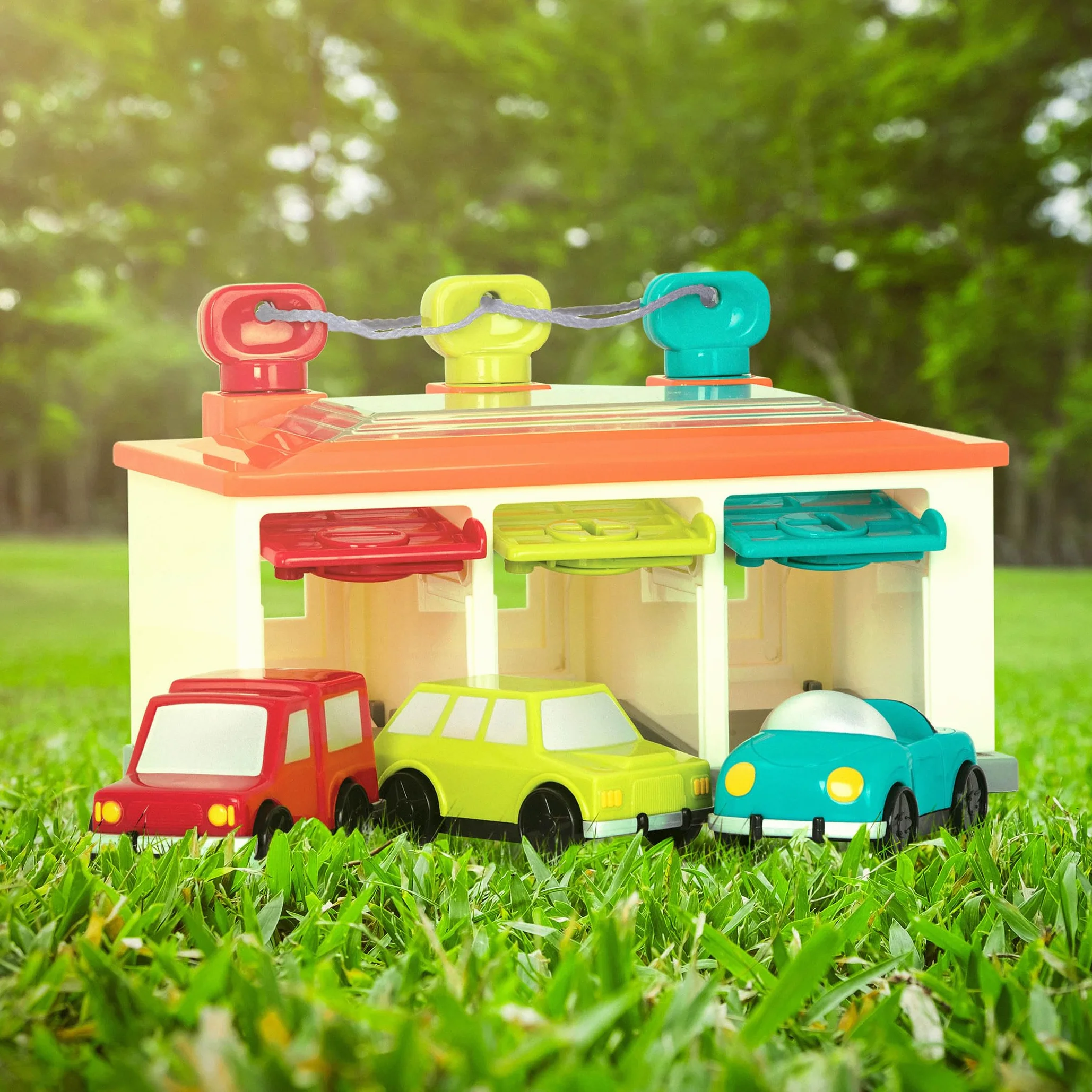 Battat - Garage per 3 Auto - Garage per Auto Playset - Giocattolo Causa-Effetto - Giocattolo di smistamento con codice Colore - 2 Anni +